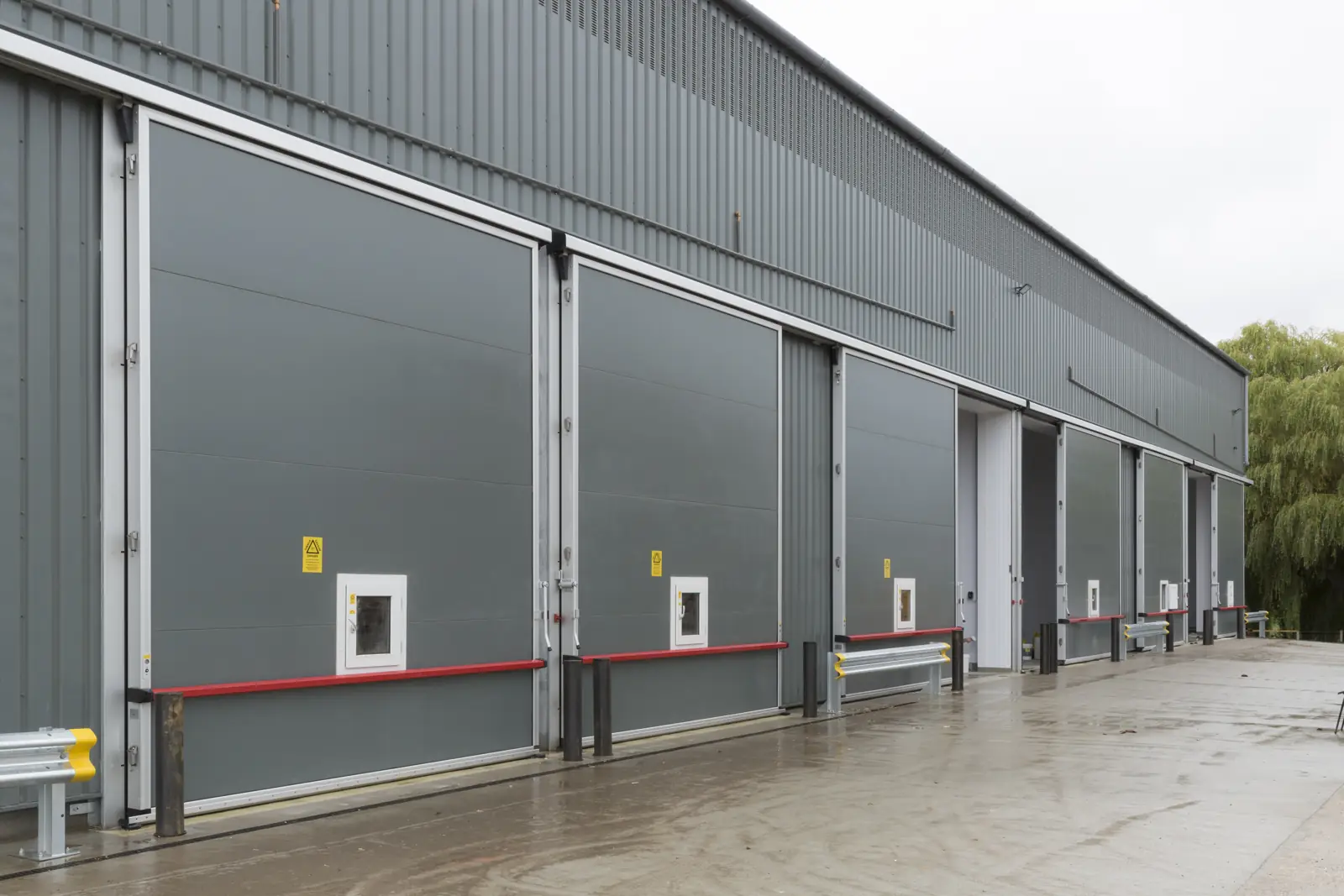 Gas-tight doors on a row of controlled atmosphere stores