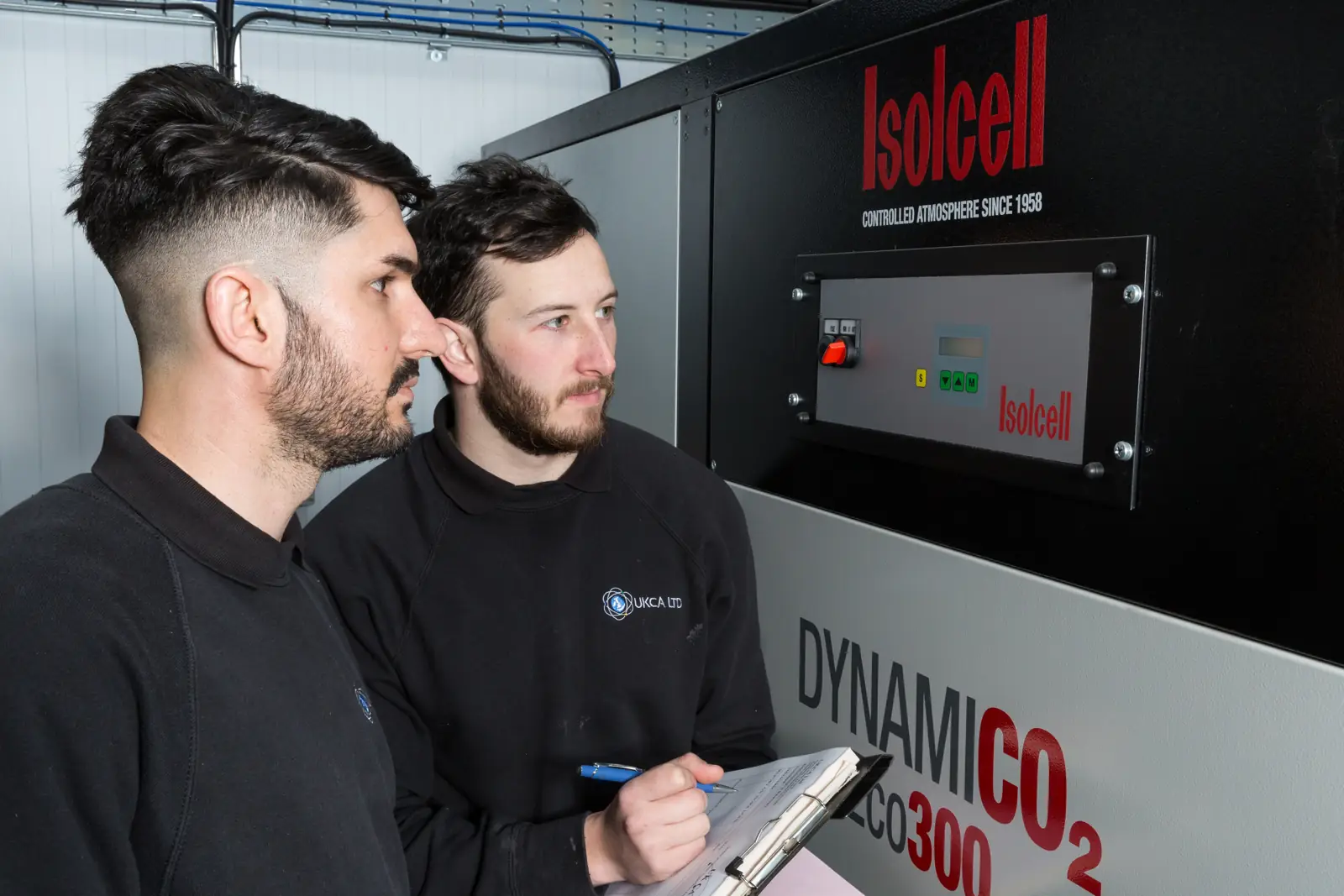UKCA engineers checking an Isolcell DynamiCO2 unit