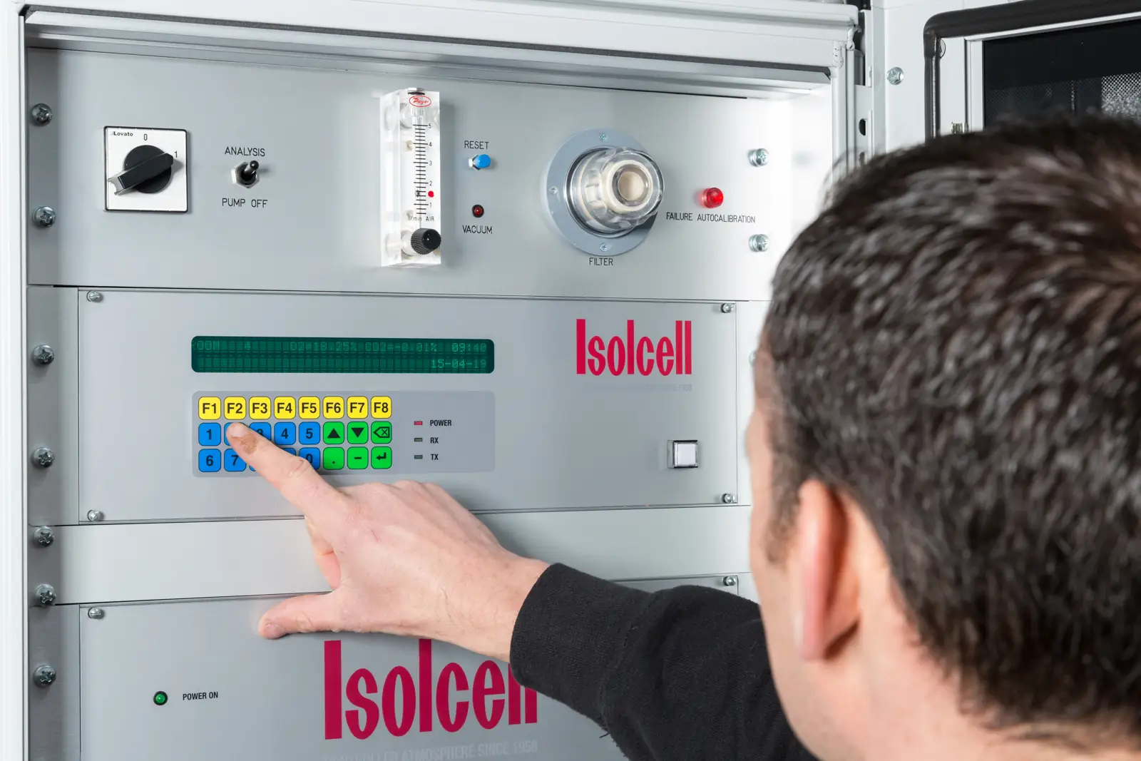 Engineer at the controls of an Isolcell CA unit